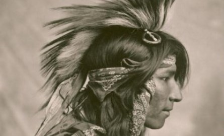 Indigenous man in gown.