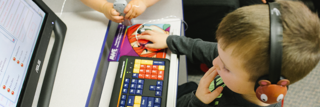 Child at a computer.