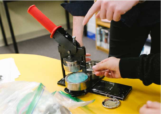 Button Maker on a table.