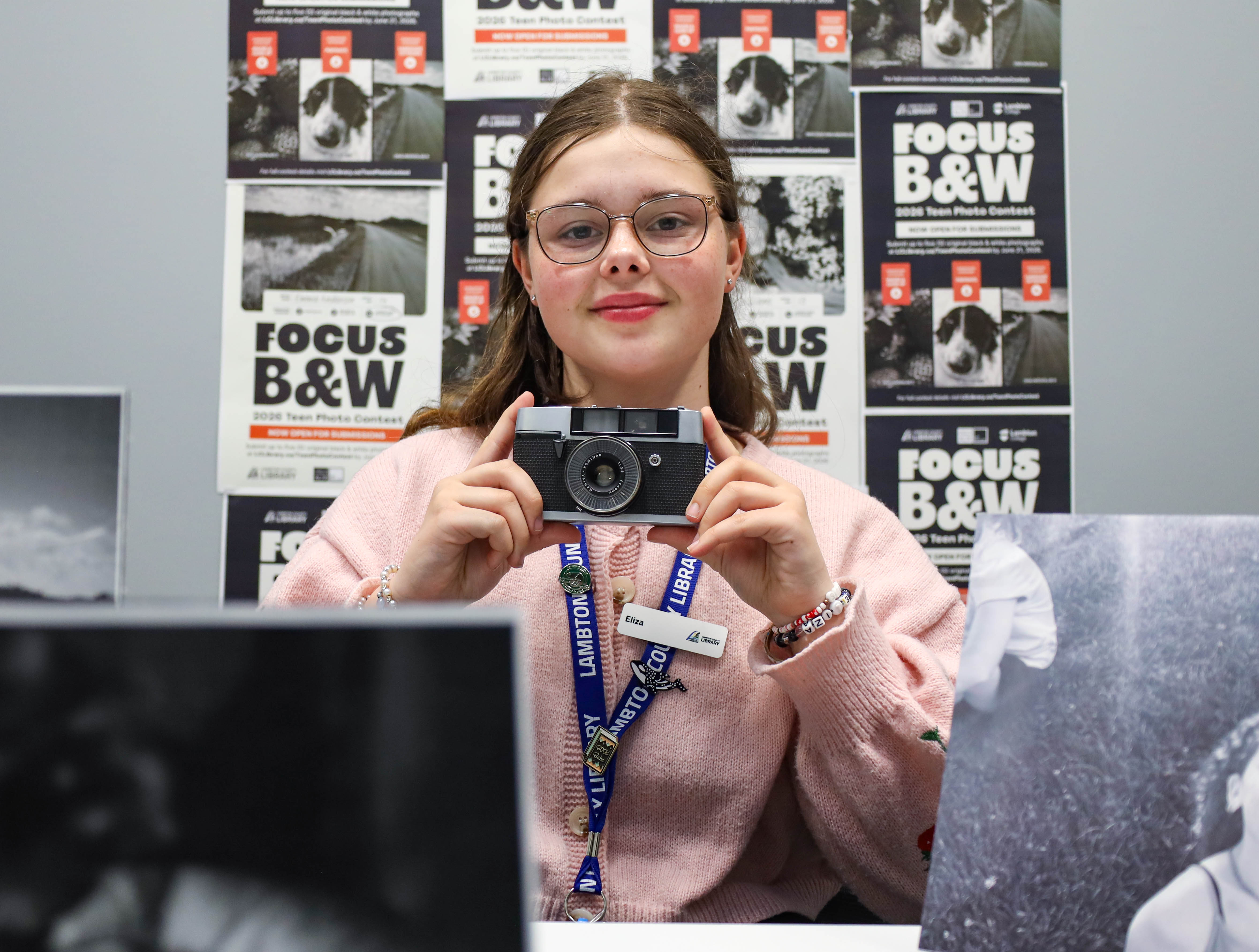 Forest Library student page, Eliza Cudmore Rombouts, gets behind the camera to promote this year's Teen Photo Contest 