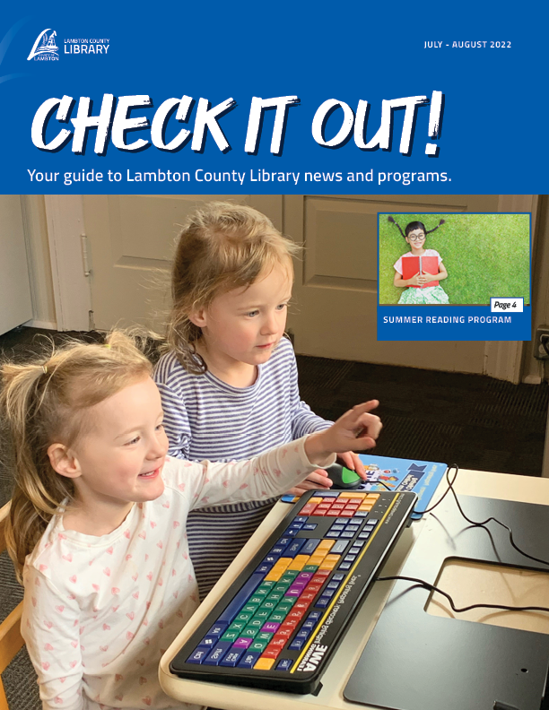 Two blonde hair kids playing on a children's computer at a library.