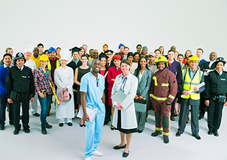 People of various occupations stand together in their respective uniforms.