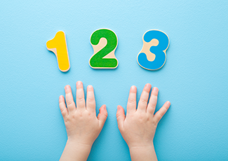 a blue background with childrens hands and the number 1, 2, 3 above them