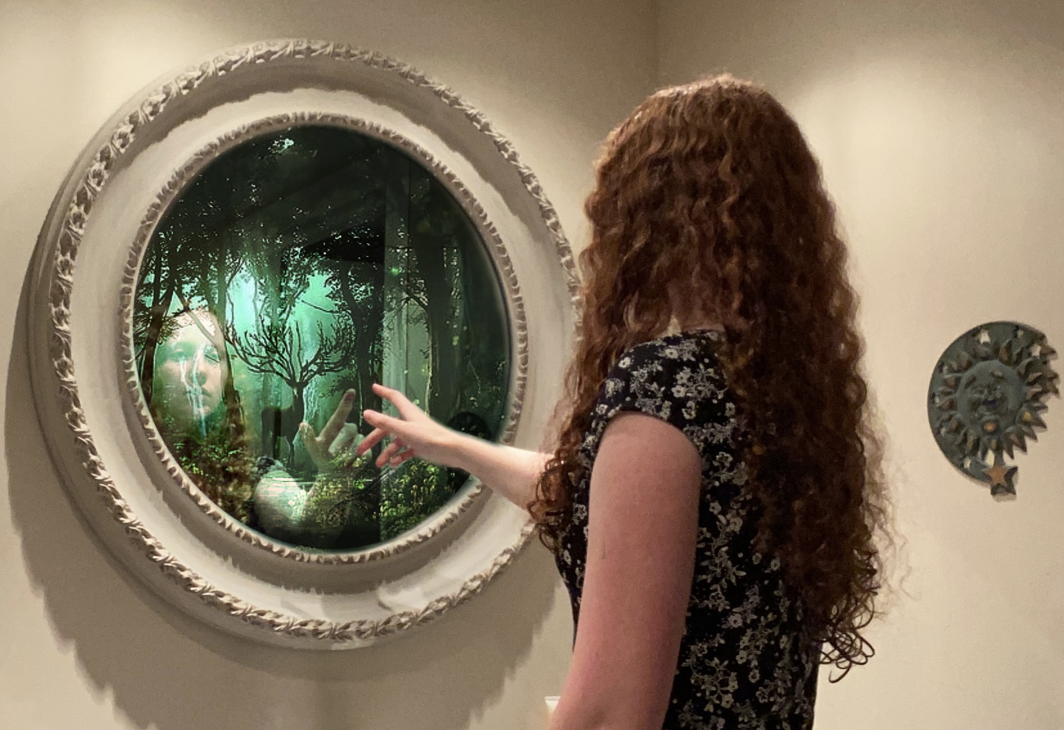 woman looking into mirror that shows forest scene
