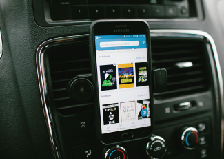 Phone on a dashboard.