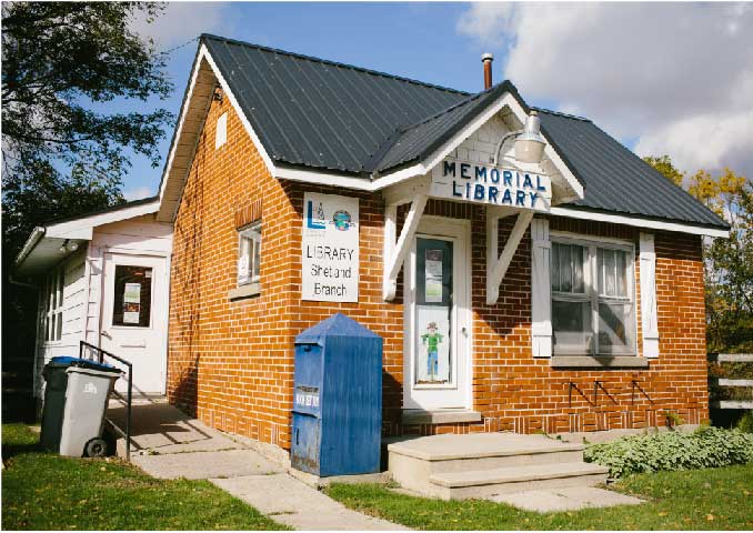 Small red brick building.